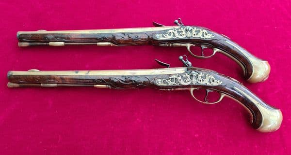 An extremely fine & very long pair of Liege Flintlock Pistols of high quality. Circa 1740. Ref 3927